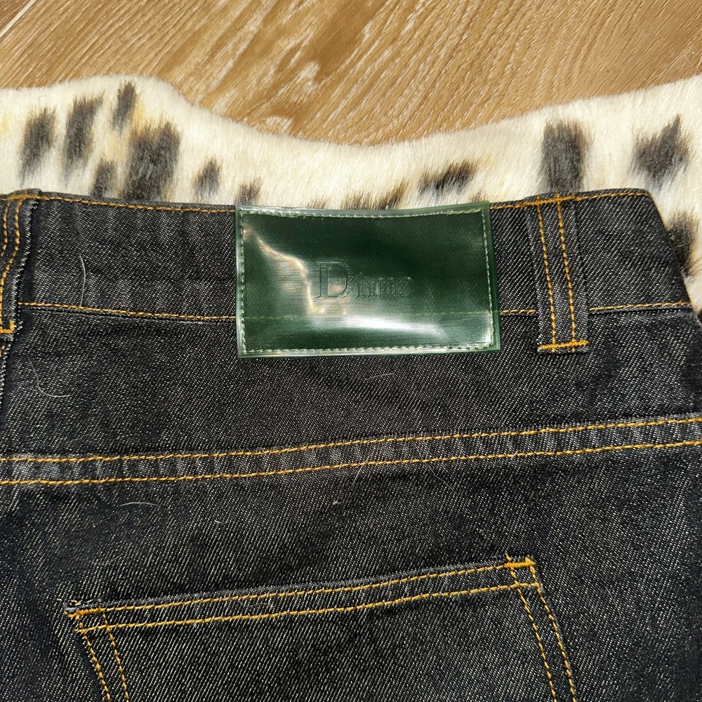 Relaxed Black Jeans with Green Leather Patch